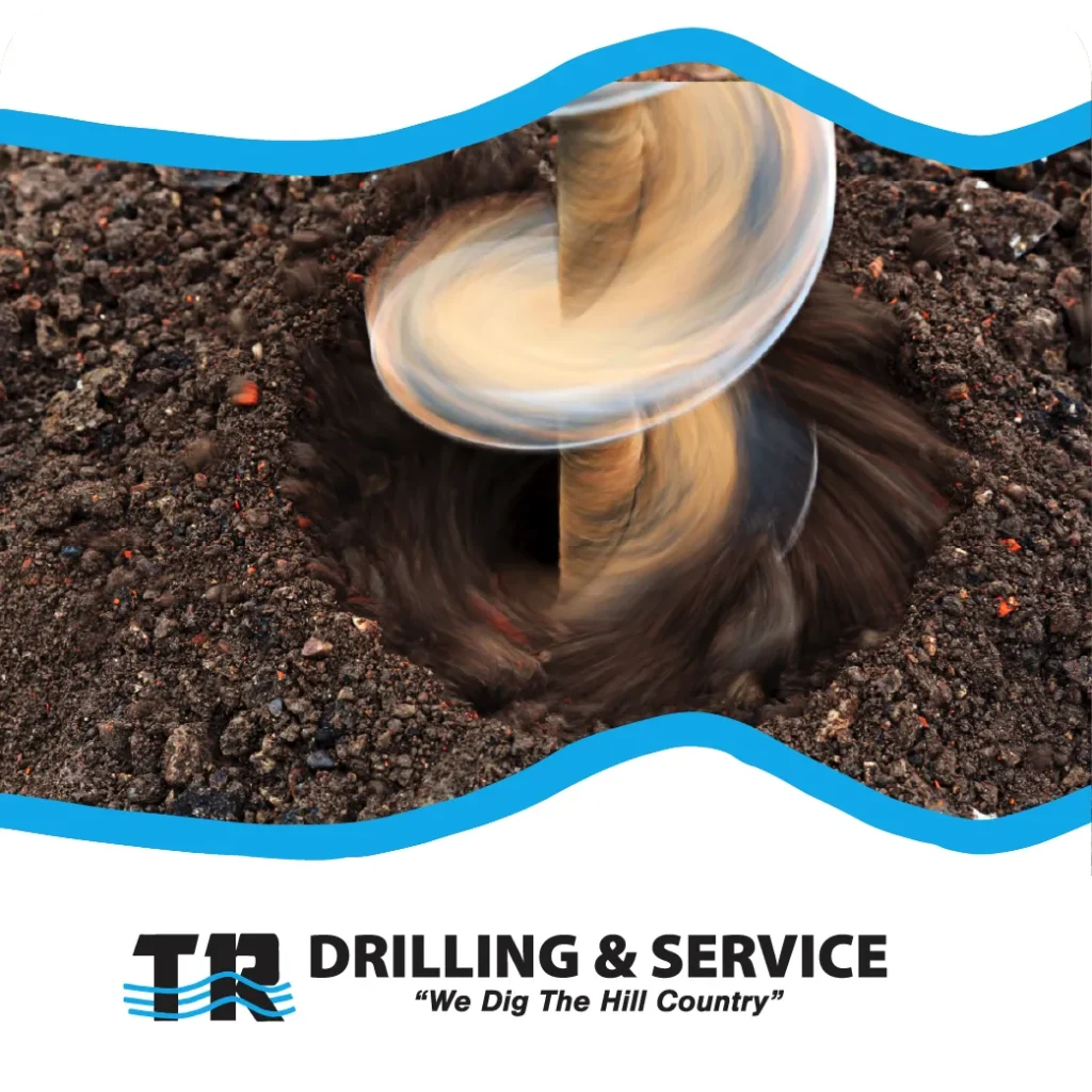 Rotating drill auger boring into soil with TR Drilling & Service branding below